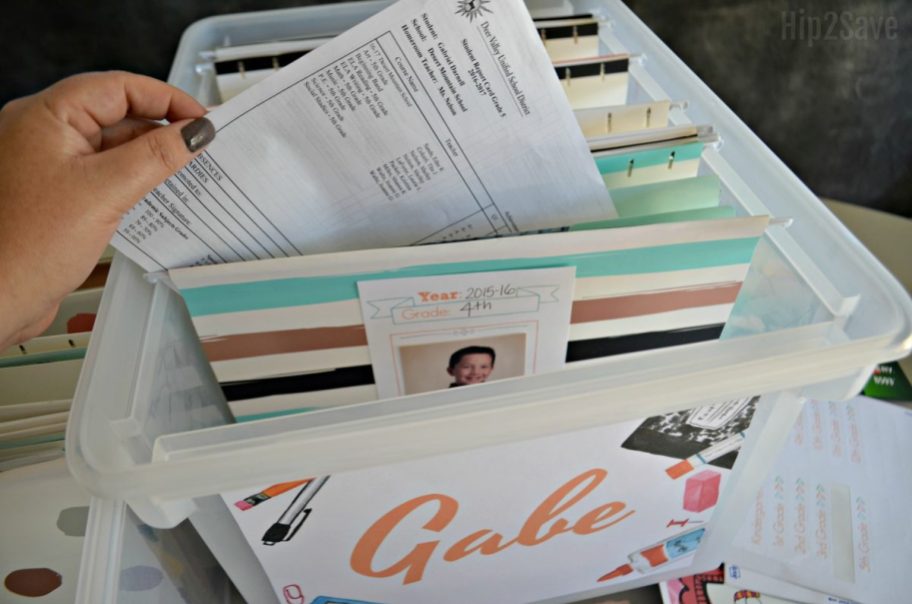 woman pulling a paper from a school paper organizer bin