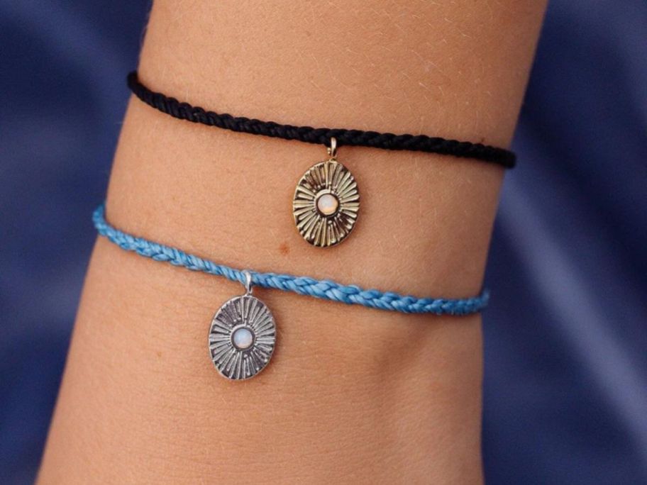 Pura Vida Sun Ray Charm Bracelets on wrist