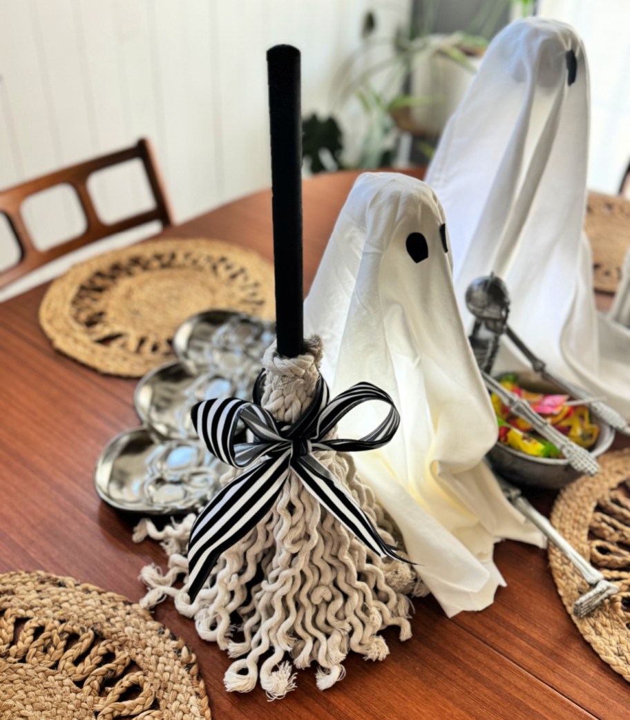 witch broom plunger craft on a table